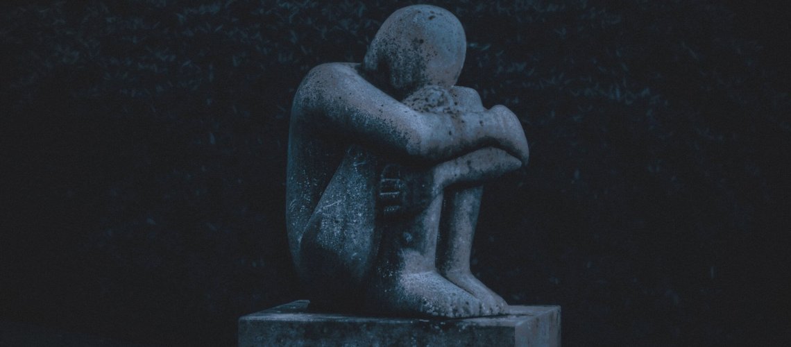 sad-statue-k-hd-x-scaled.jpg