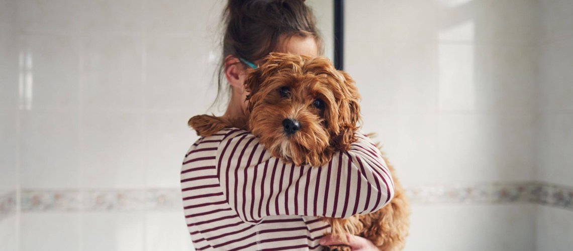 woman-bathing-her-puppy-royalty-free-image-.jpg